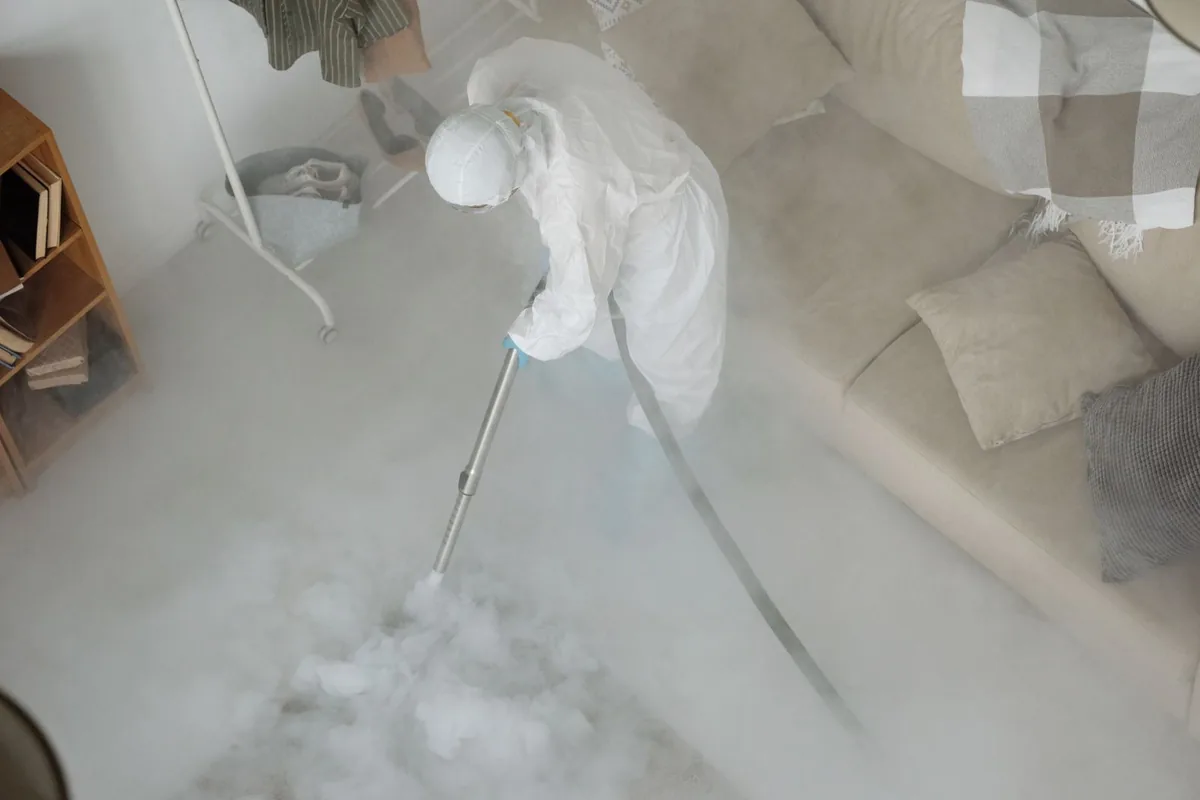Biohazard cleanup technician in protective equipment, Park Layne, OH